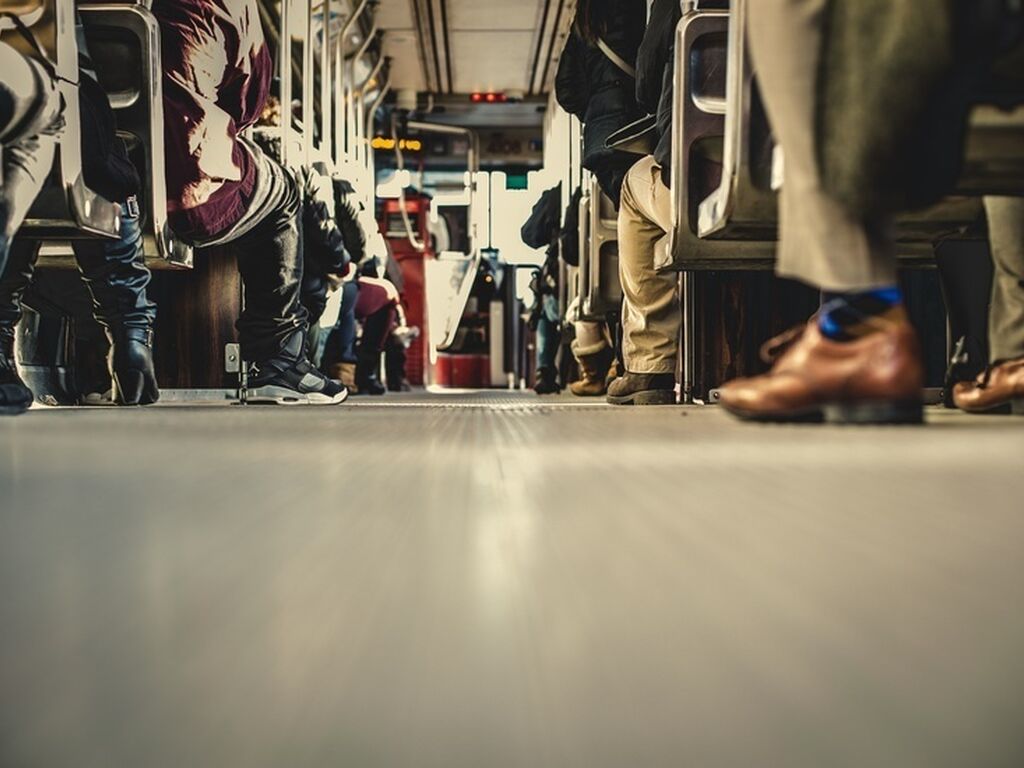 People feet train travelling large